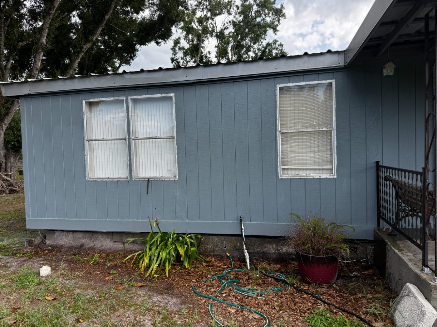 Painted siding clean and even after a low pressure house wash